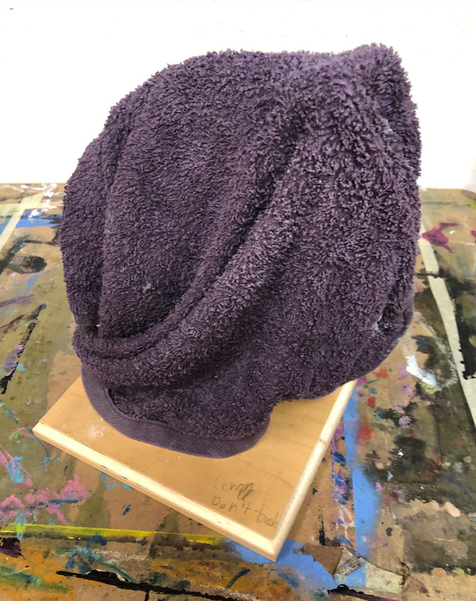 Sculpture covered with wet towel